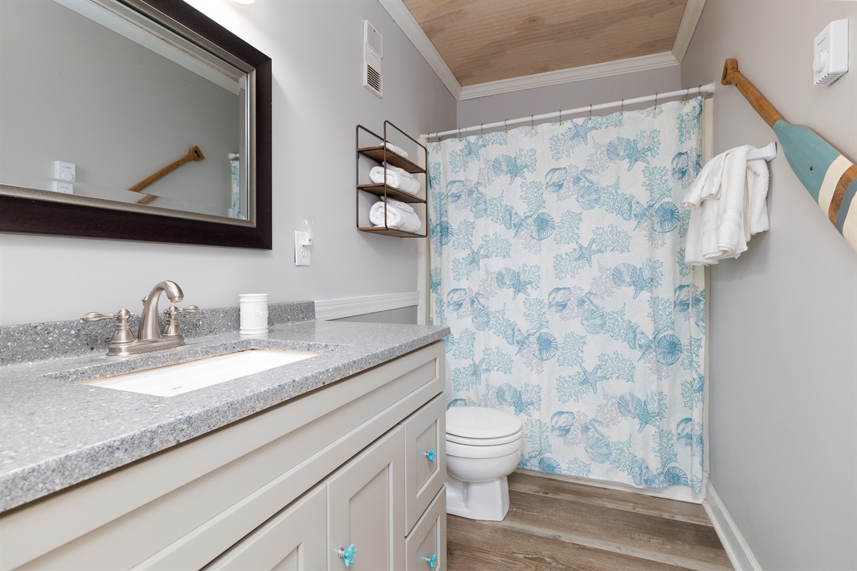 Spacious and clean bathroom with vanity
