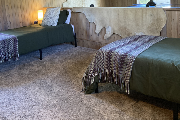 The loft with 2 extra long twin beds.