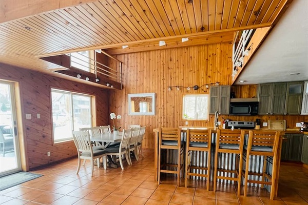 Open dining and kitchen area perfect for group meals and gatherings.