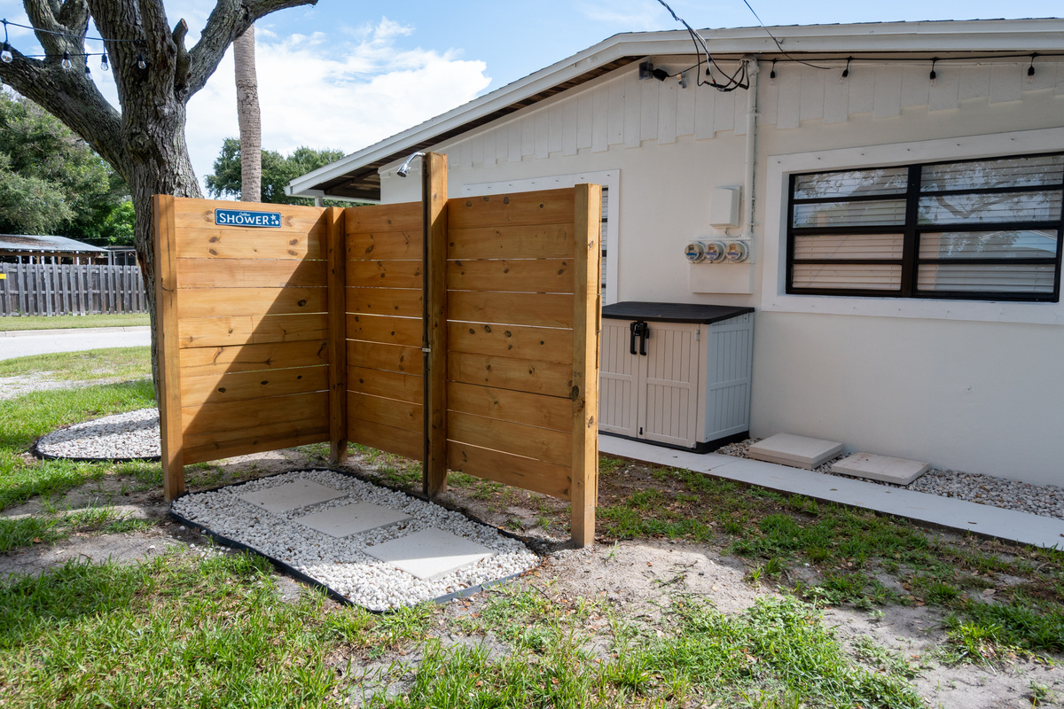 Shared outdoor rinse-off shower for all six suites