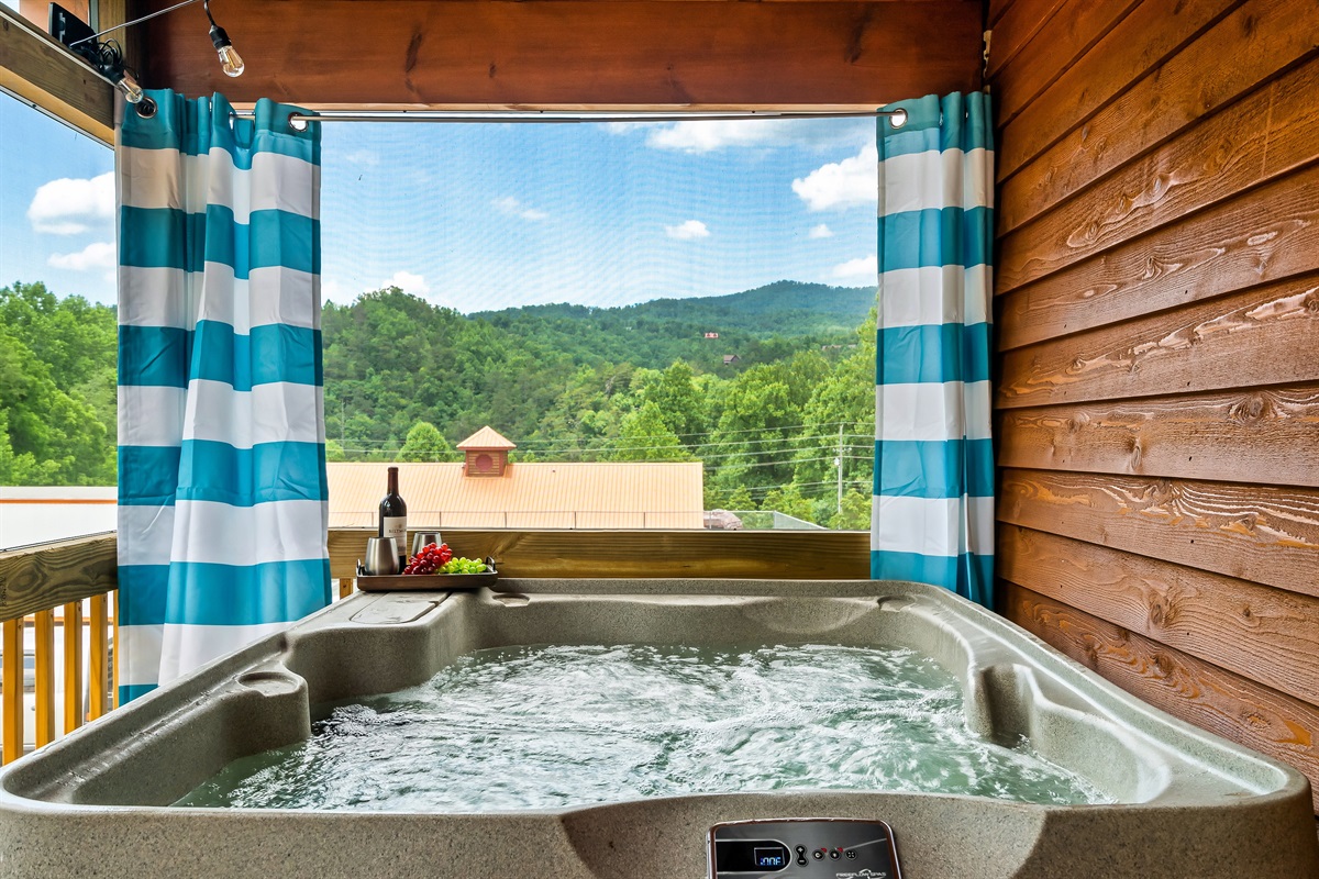 Enjoy views of the mountains from the hot tub.