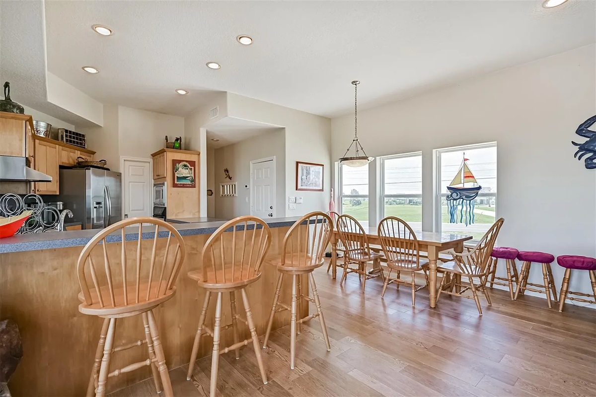 Dining area seats 12-16 with more outdoors