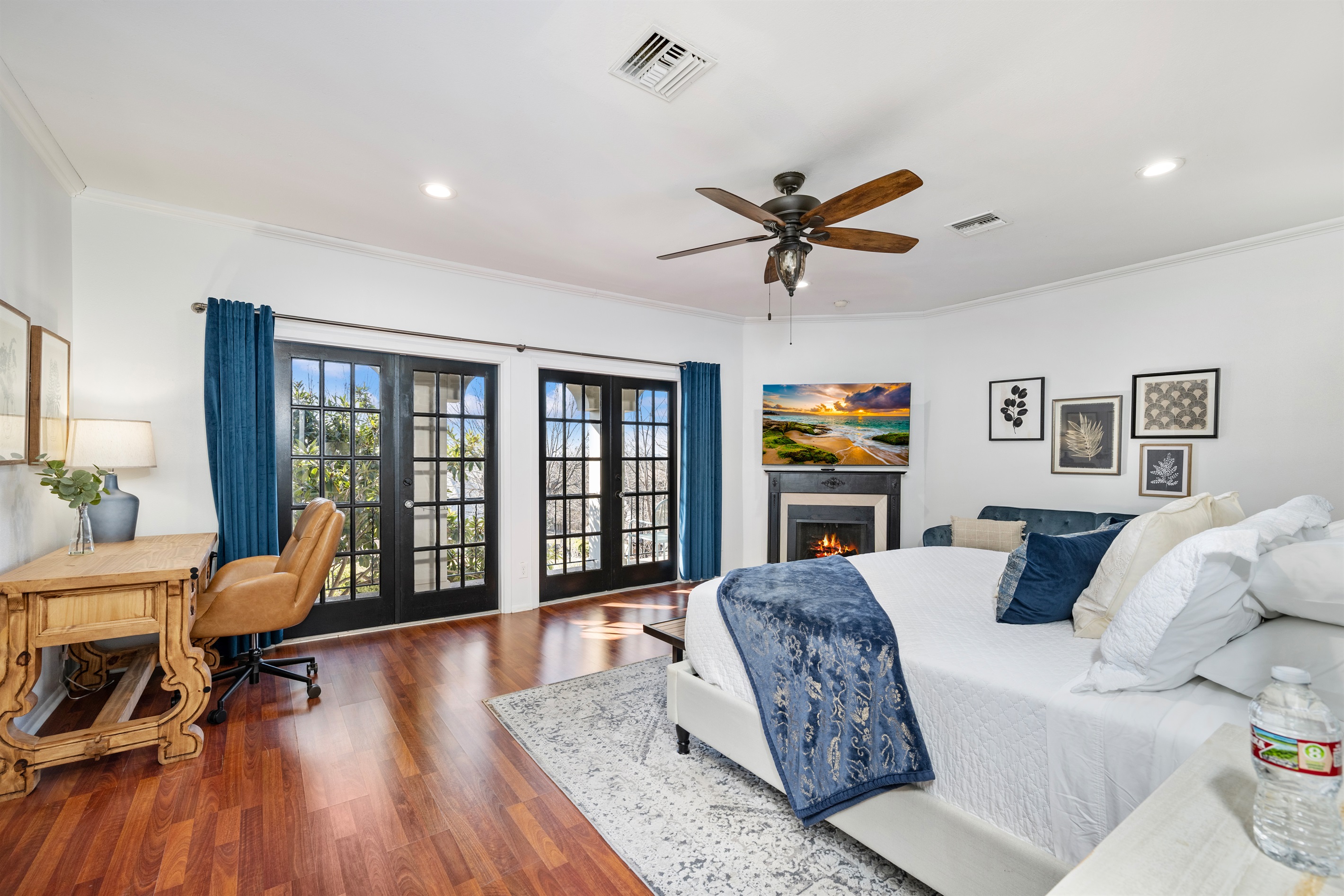 Luxury Master Suite with balcony, sofa and work station