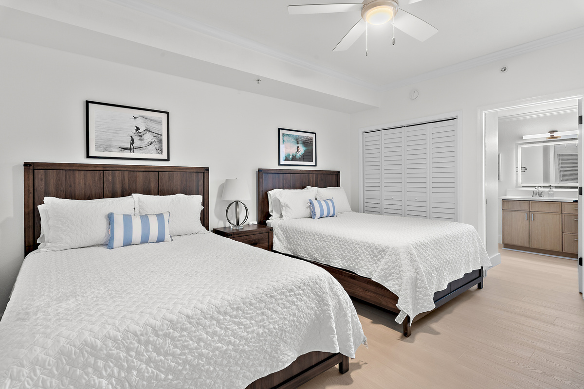 Guest Bedroom 2: Two Queen Beds, Smart TV, Private Bathroom with Shower/Tub Combo (sleeps 4)