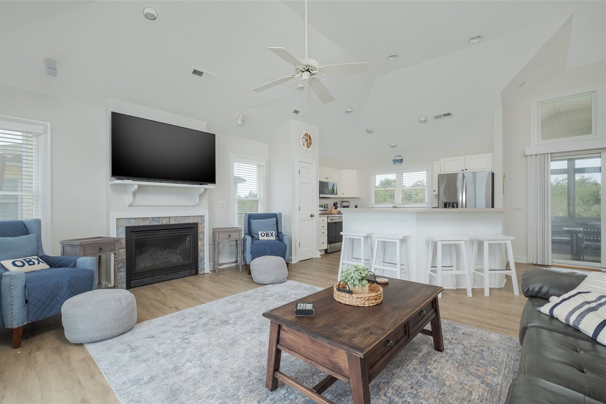 Stylish and inviting living space with modern amenities and fireplace.