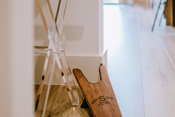 Hill Country craftsmanship throughout Cutter's Quarters &mdash; handcrafted modern Western details at the flagship suite of Gaines Ranch on the Square.