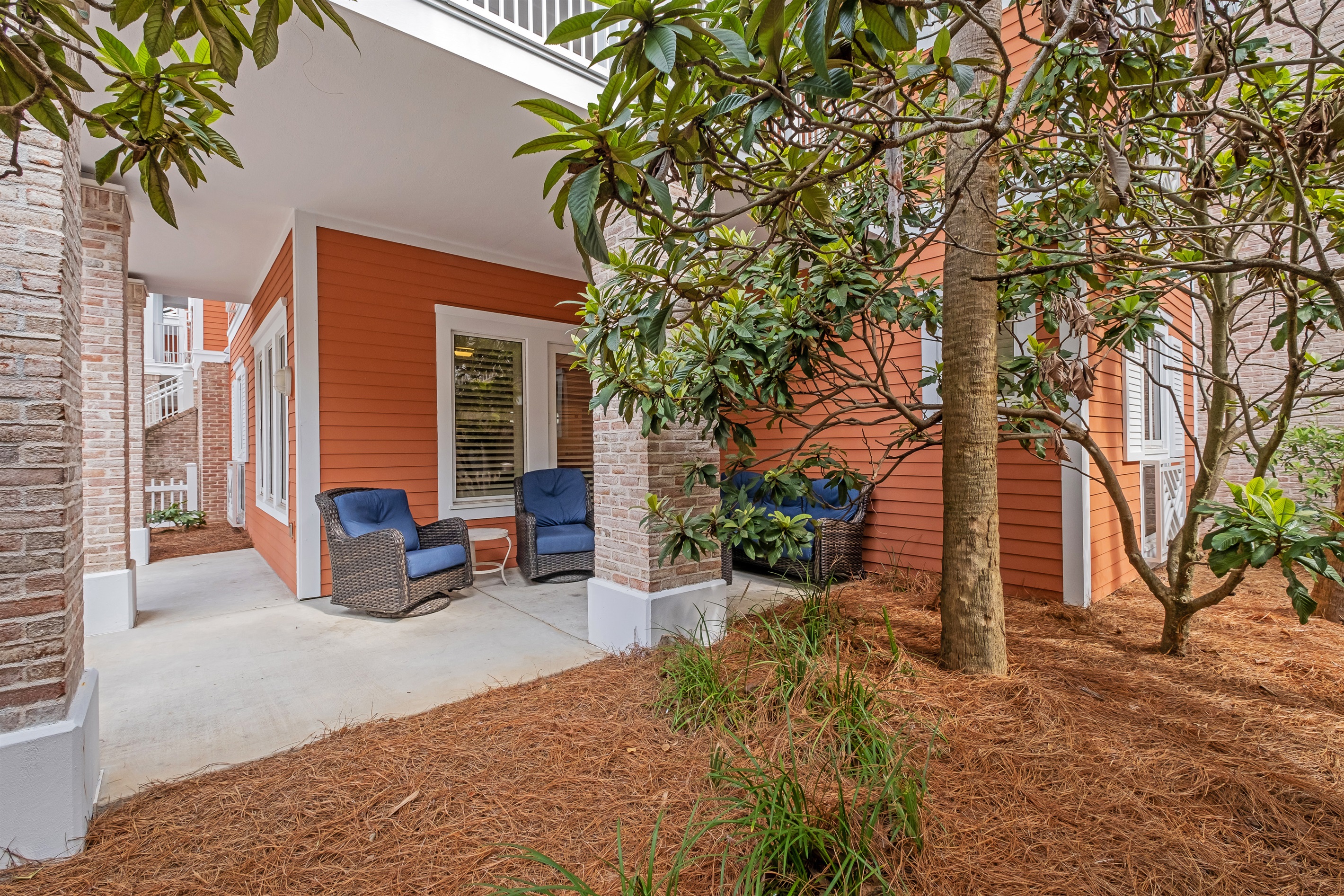 Relax in this inviting outdoor seating area, perfect for lounging and enjoying the fresh air. A quiet corner for reading or socializing with friends.