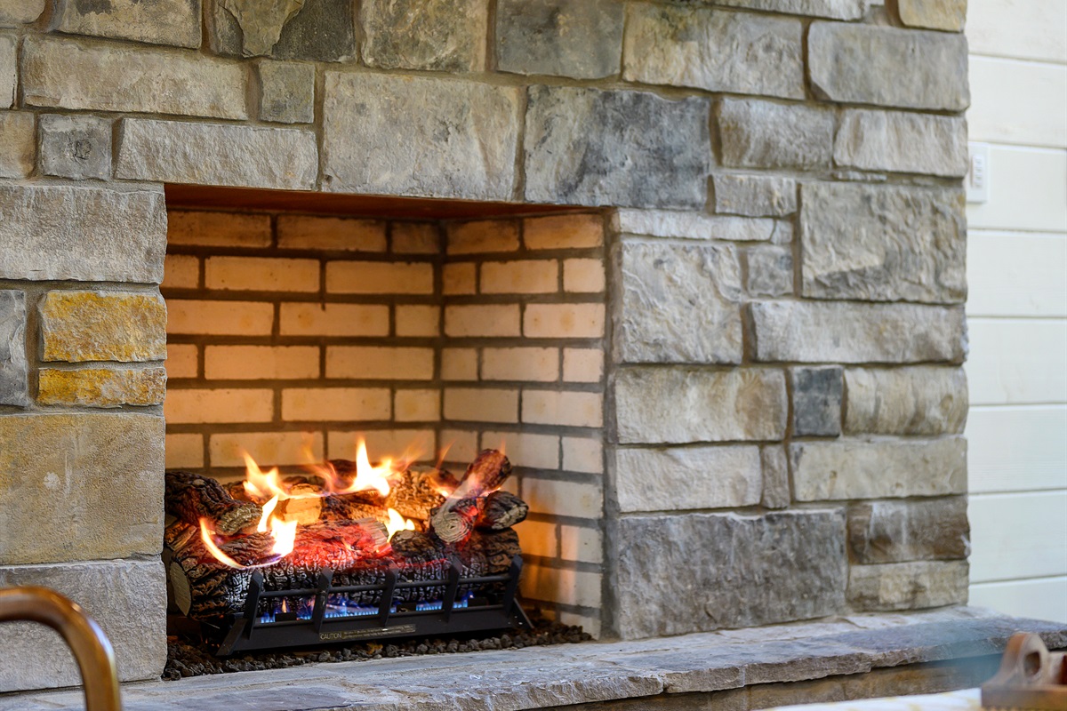 Warm indoor fireplace for a cozy cabin experience