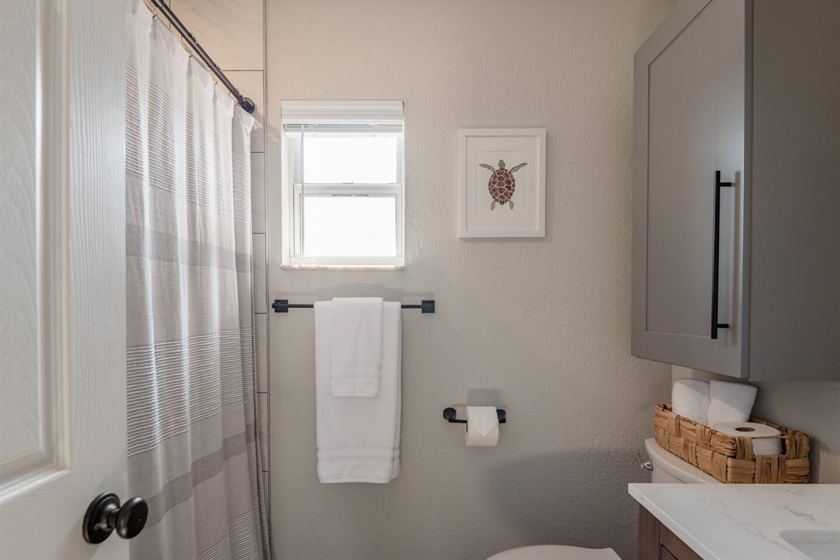 En suite bathroom in the first bedroom