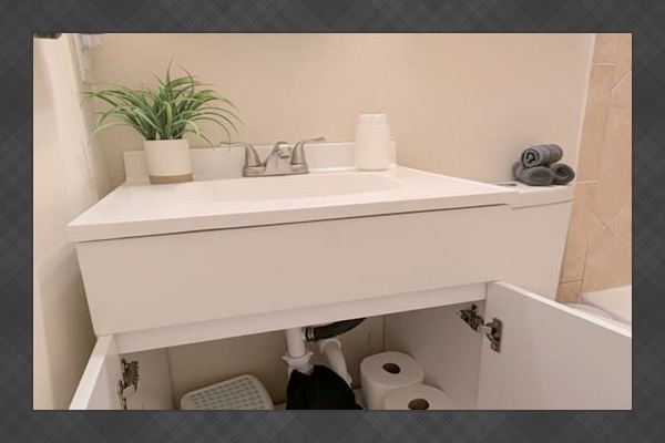 Full bath has foaming hand soap, hair dryer, extra toilet paper, and step stools. 