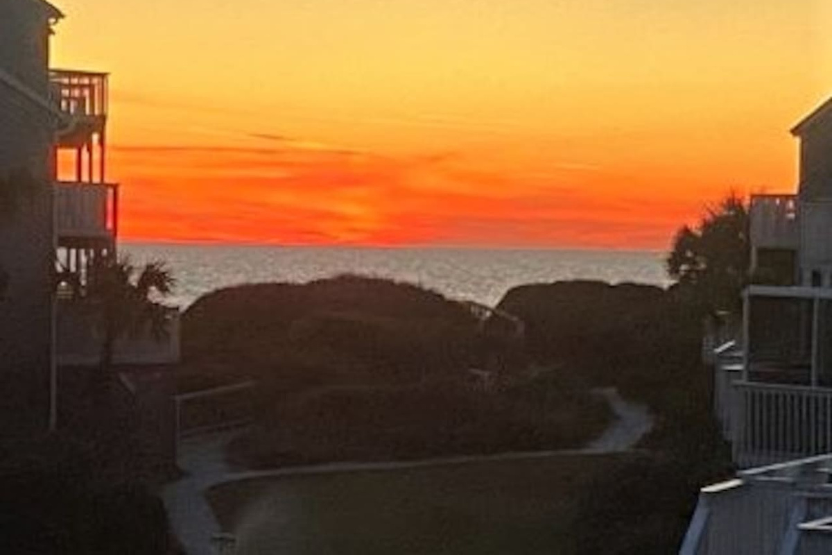 Watch the sunset from the master deck &mdash; this is what you came for, and it delivers every evening.