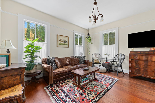 Historic soul, modern comfort. Settle into the Restoration Hardware leather sofa in front of the gas fireplace, stream a movie on the large smart TV, browse the books, or play board games (provided). At night, the sofa converts into a queen sized bed.