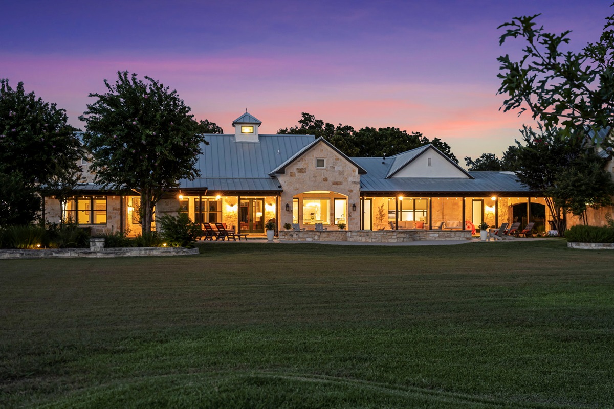 Twilight hues painting the sky over a peaceful home.