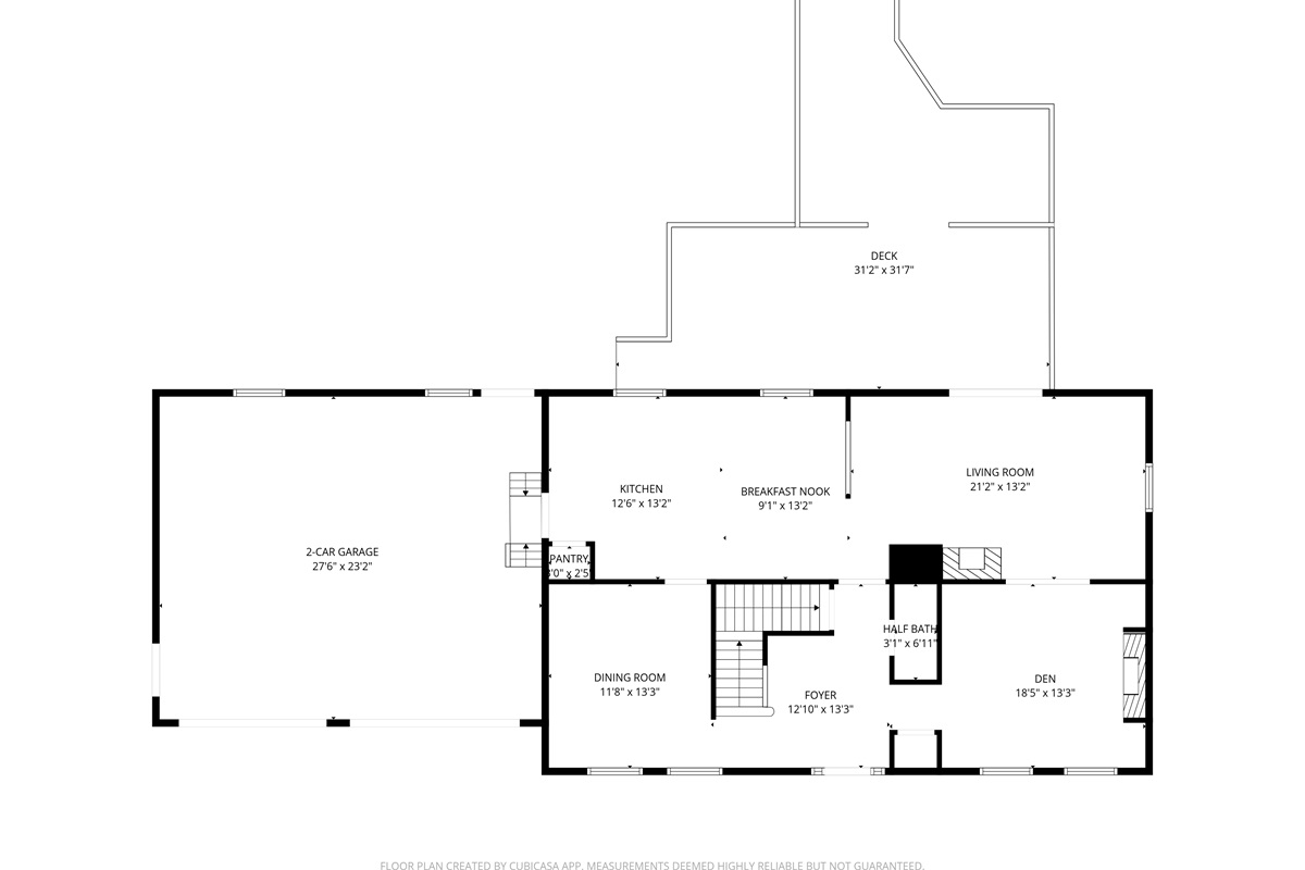 The open main floor leads to a massive deck and fire pit area, ideal for outdoor seating and grilling. This Mount Desert Island layout features a gourmet kitchen and high-speed Wifi, perfect for a family vacation rental near Acadia.