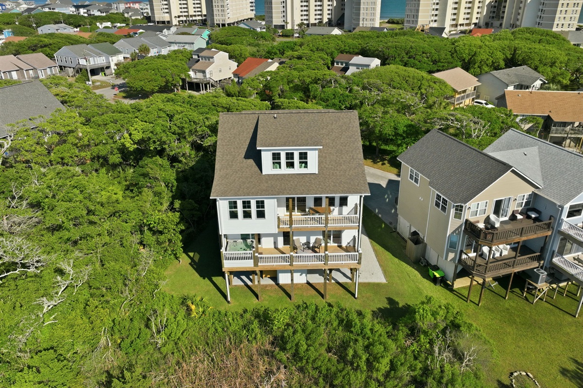Enjoy the best of both worlds with marsh views behind and the beach just minutes away