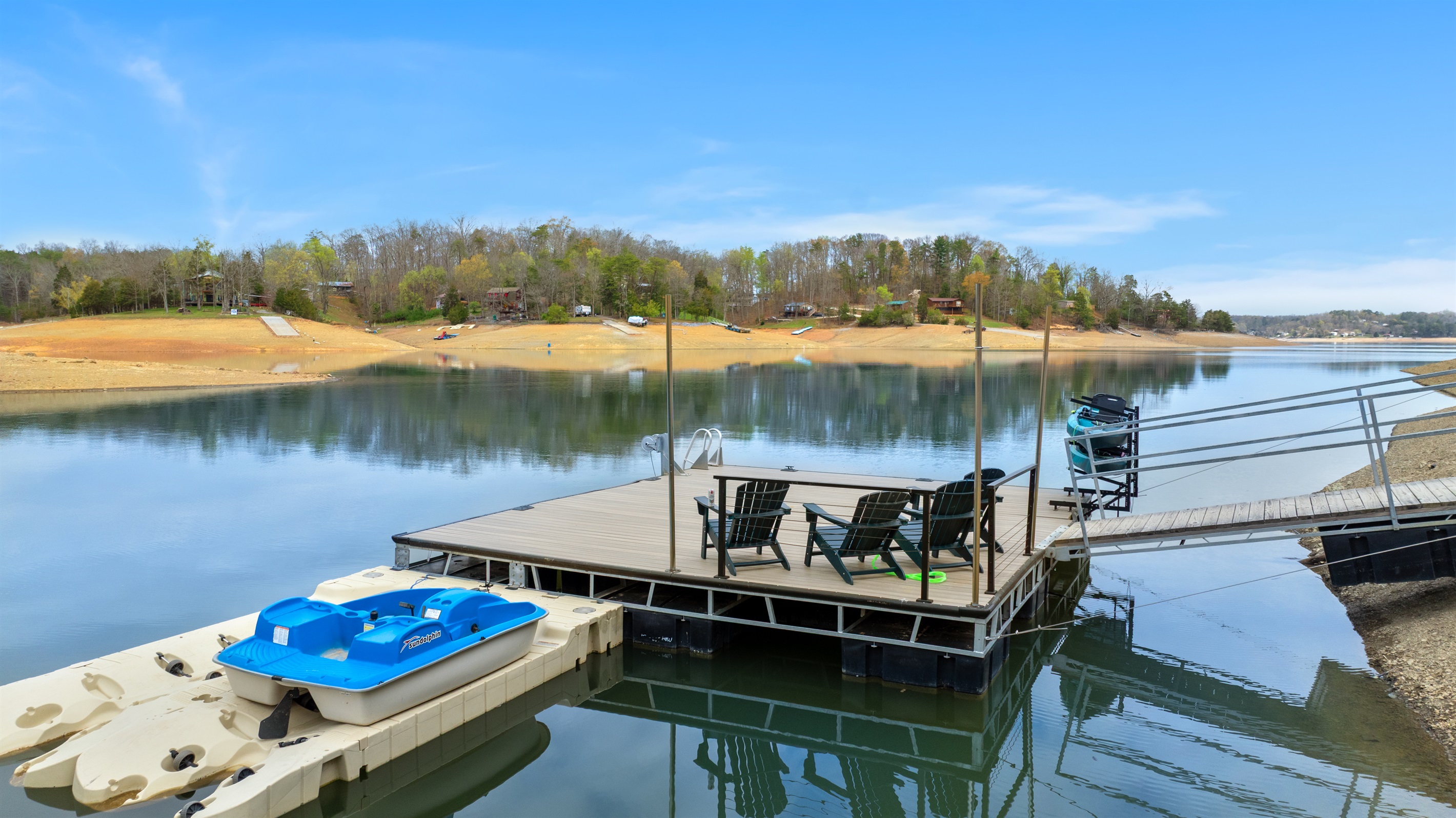 Brand new dock, 2 jet ski ports, lounge chairs, 2 kayaks and paddleboat. (Note, this is low water in mid-march)