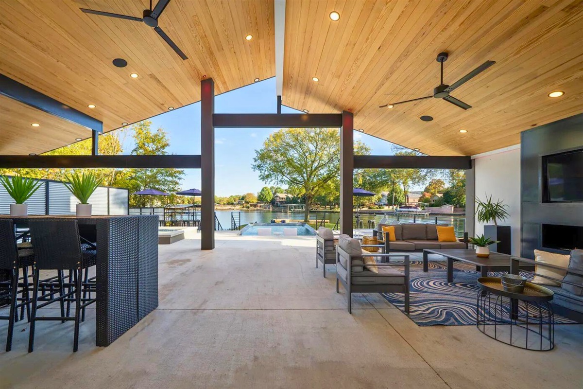 [Outdoor Dining Area] A Lakeside Home Would Not be Complete Without a Luxurious Private Backyard and Patio Area.