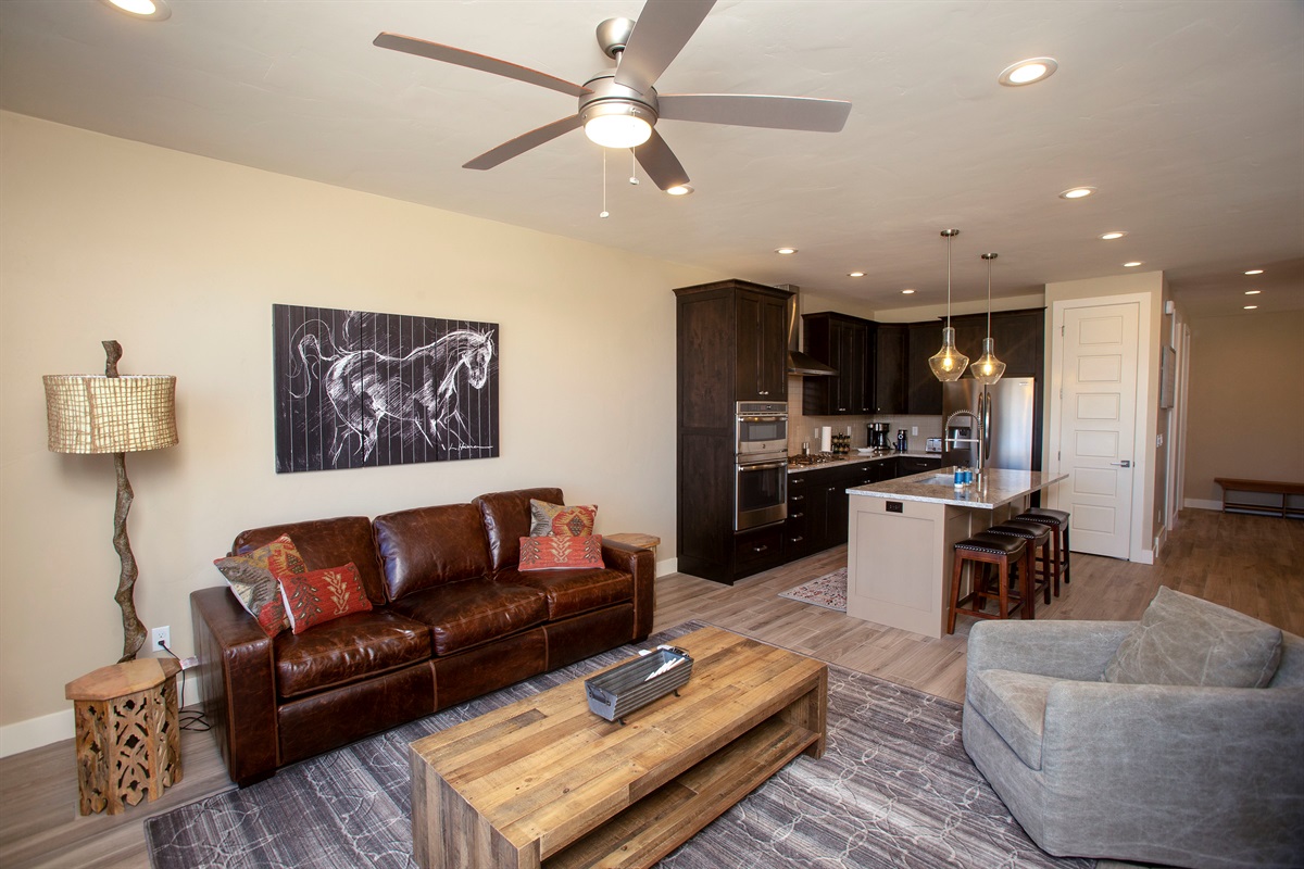 Open-concept living space flowing seamlessly into the kitchen—ideal for gathering and entertaining.