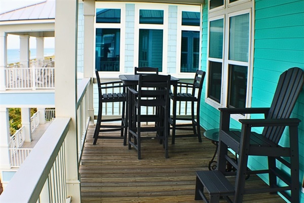 Outdoor Dining Oasis: Enjoy meals with breathtaking ocean views from your private deck!