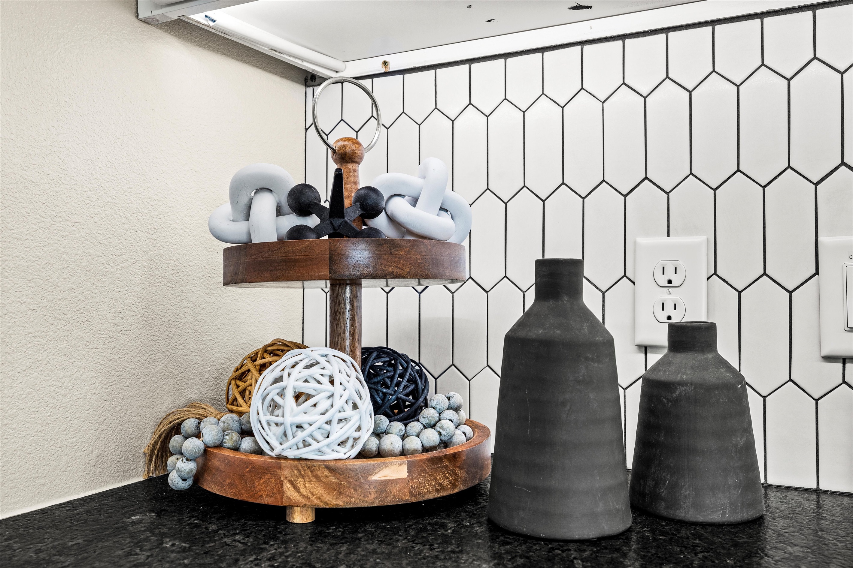 Chic Kitchen Nook: Stylish decor and sleek finishes create an inviting culinary escape!