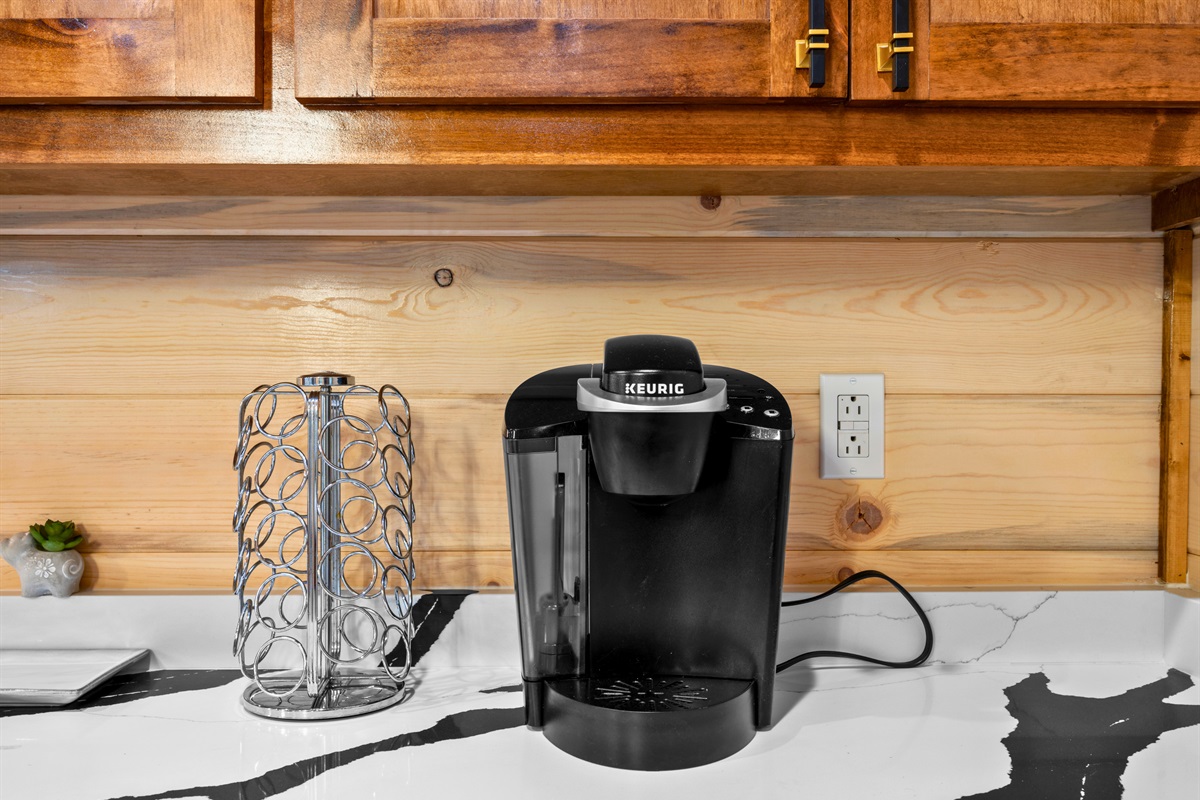 A convenient coffee station is ready for early mornings, so you can brew a fresh cup before heading out for the day.