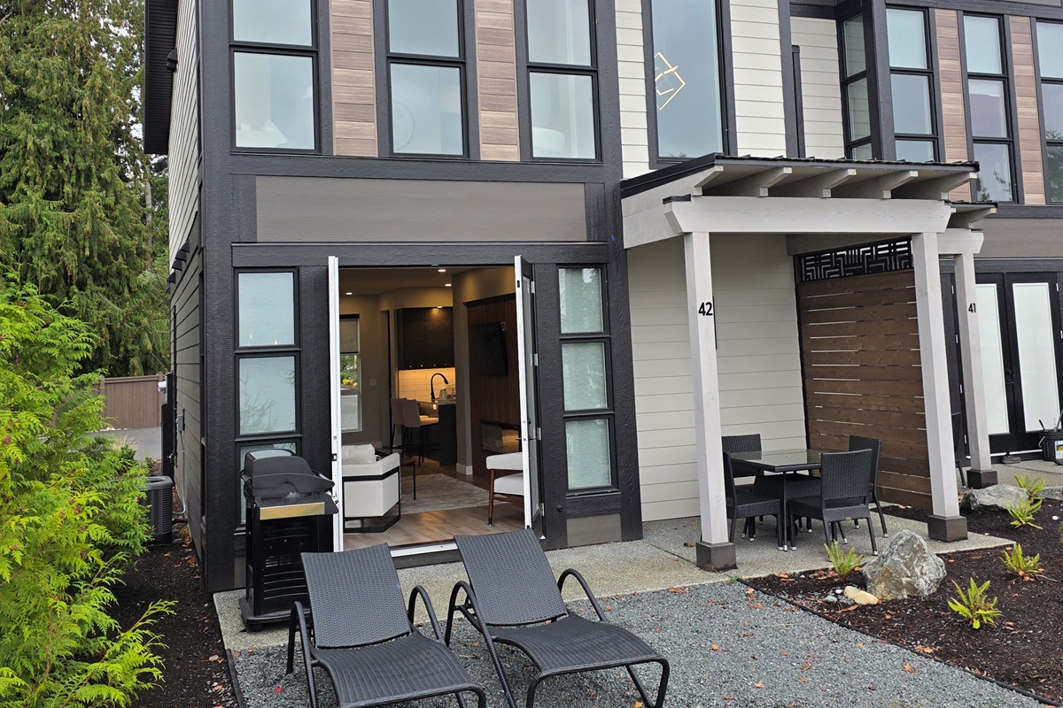Private covered patio. Double glass doors. BBQ.