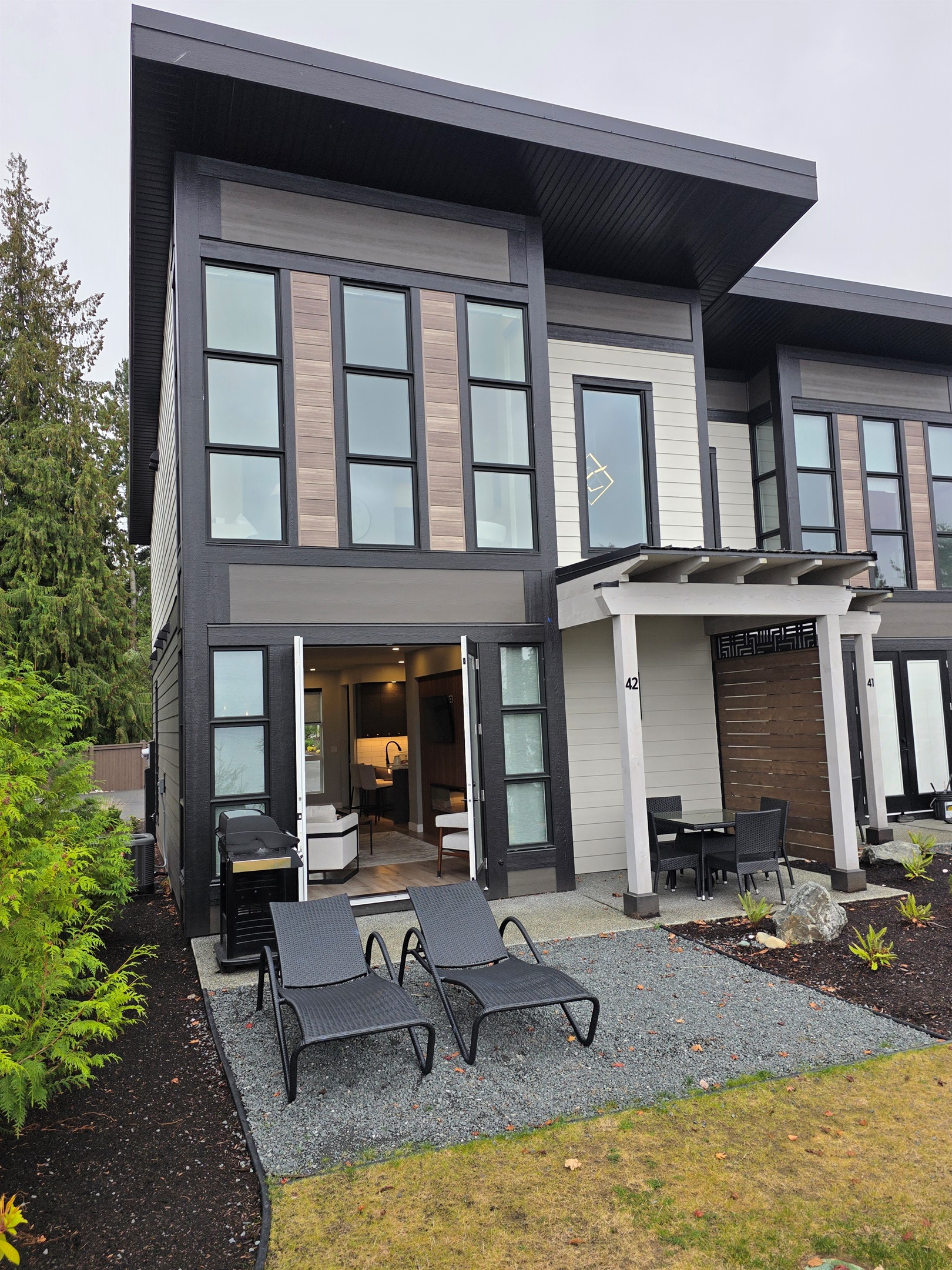 Private covered patio. Double glass doors. BBQ.