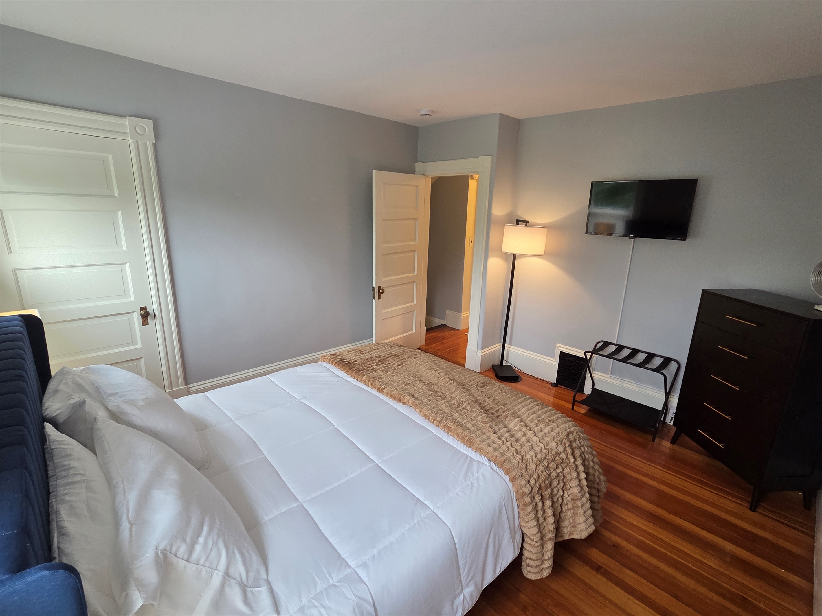 Blue Bedroom with Smart TV