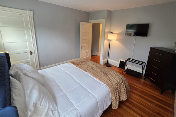 Blue Bedroom with Smart TV