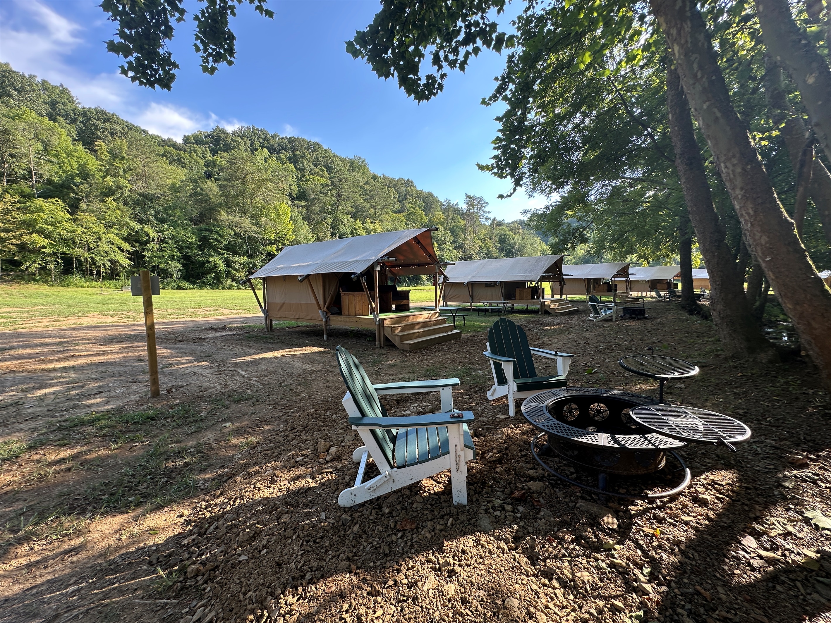 Leo has a creekside fire pit and picnic table.