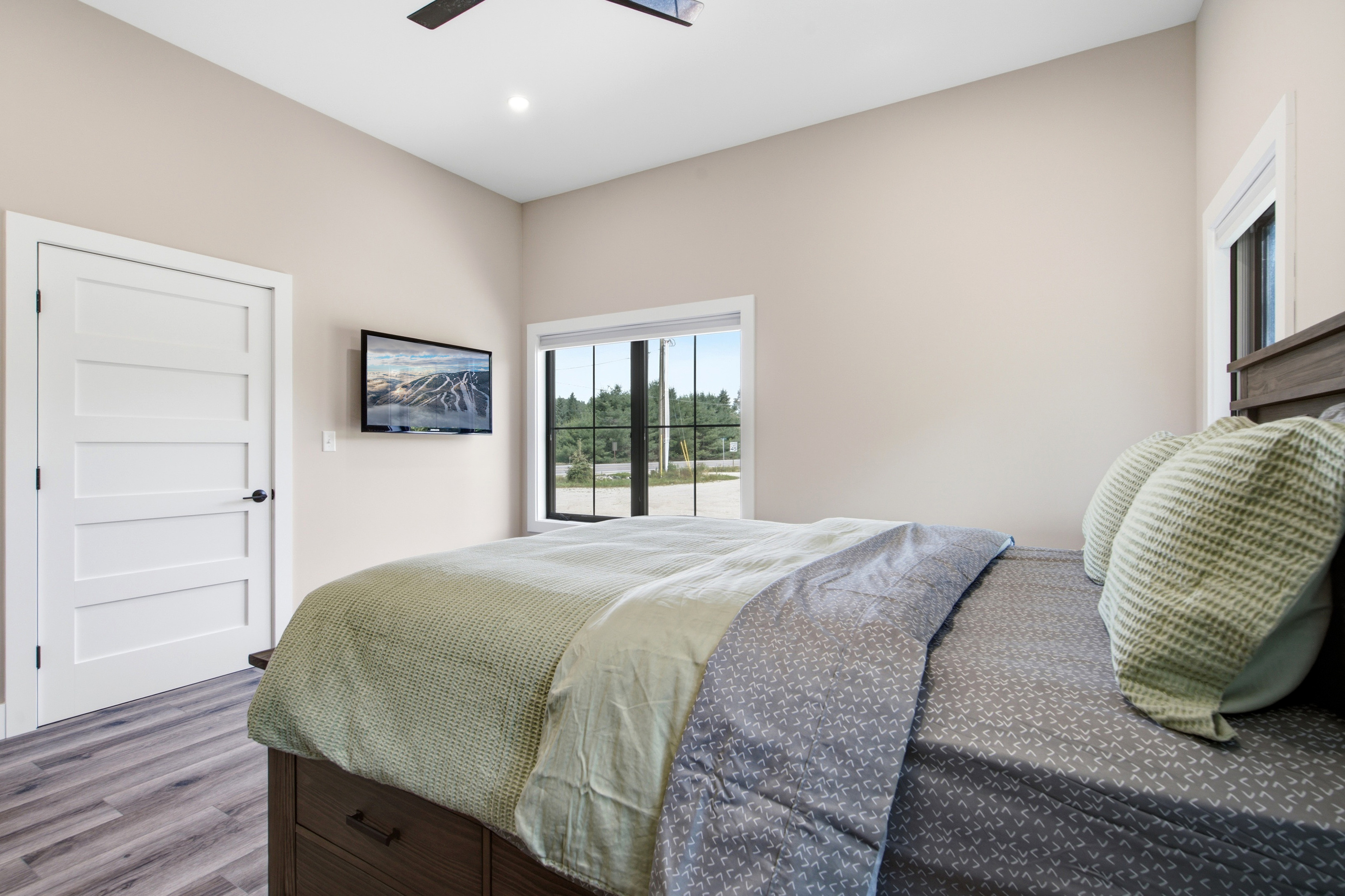 Unwind in a spacious bedroom designed for restful nights after a day of adventure.