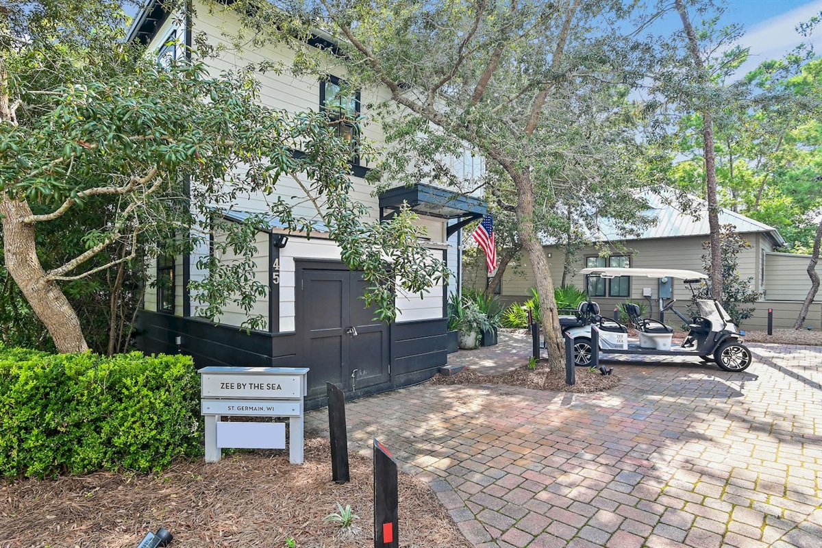 Front Entry, Shed & Parking 
Parking for 2 vehicles (max) on the paved driveway.  The shed is stocked with five bikes, beach chairs, umbrellas, soft coolers & the 6-seater LSV (Low Speed Vehicle)—everything you need for carefree 30A beach days! ☀️