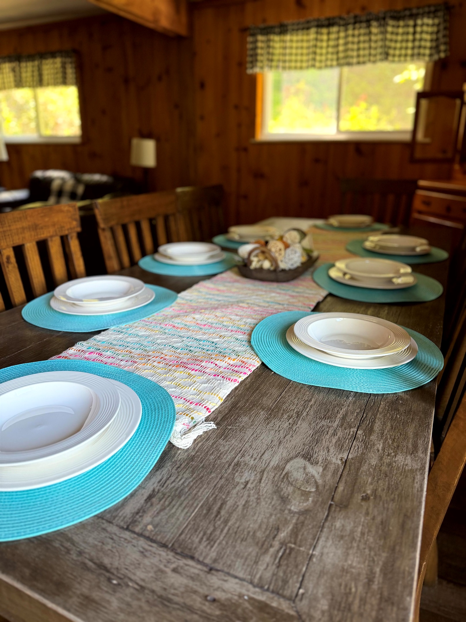 Cabin dining area — gather around the table for family meals, game nights, and mountain memories.  