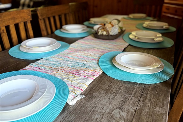 Cabin dining area — gather around the table for family meals, game nights, and mountain memories.  