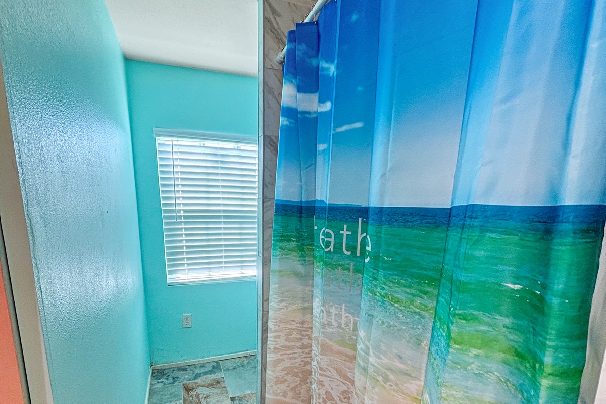 Downstairs bath has a walk-in shower