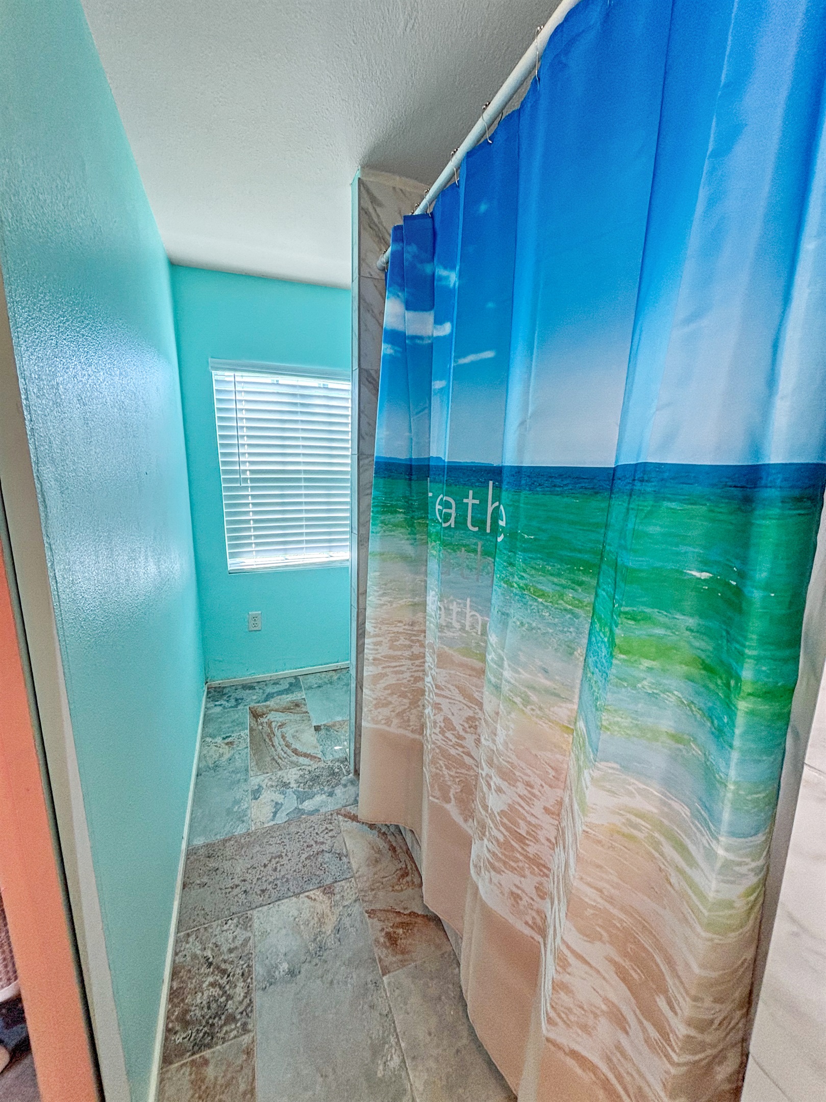 Downstairs bath has a walk-in shower