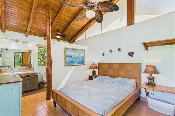 Bedroom 5.  Full size bed.  Private entrance from rest of house only accessed by outdoor covered spiral staircase.  En suite bathroom with tub/shower.  AC