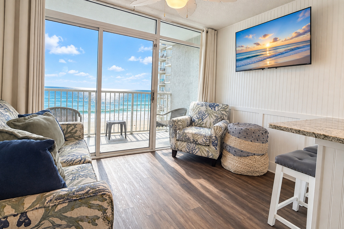 Living room and private balcony overlooking the Atlantic Ocean