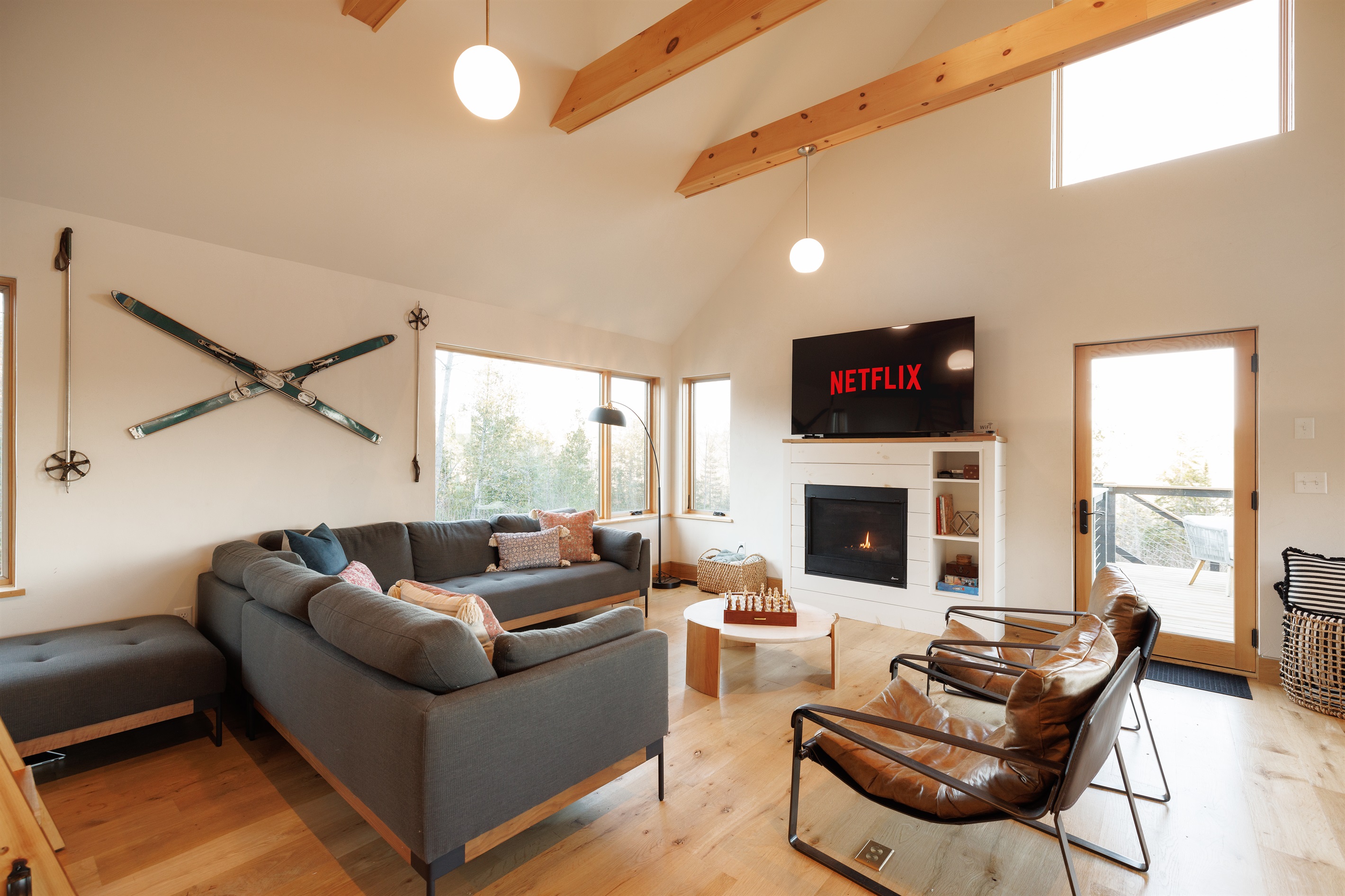 Light-filled, modern living room with vaulted ceilings