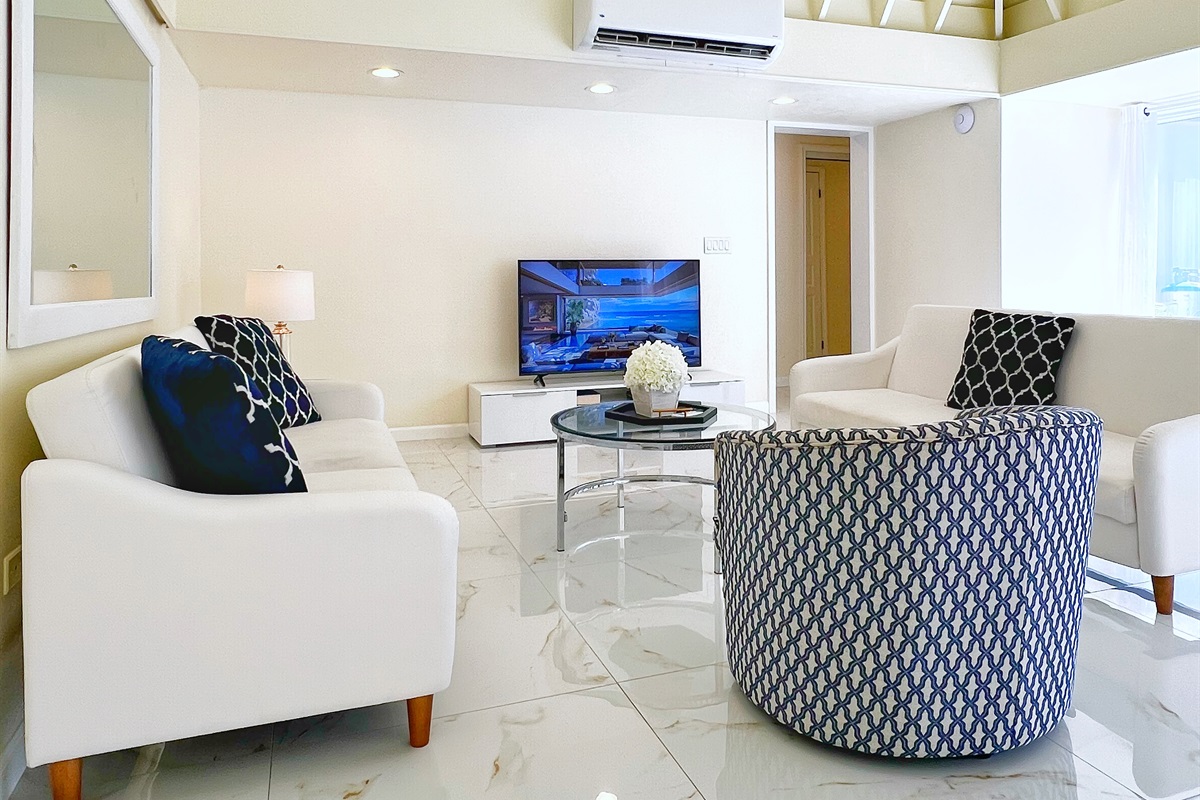A bright, modern space designed for both relaxation and entertainment.