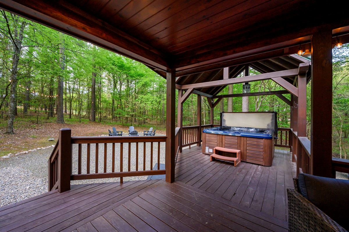Covered deck hot tub — relax and soak surrounded by the pines ♨️🌲