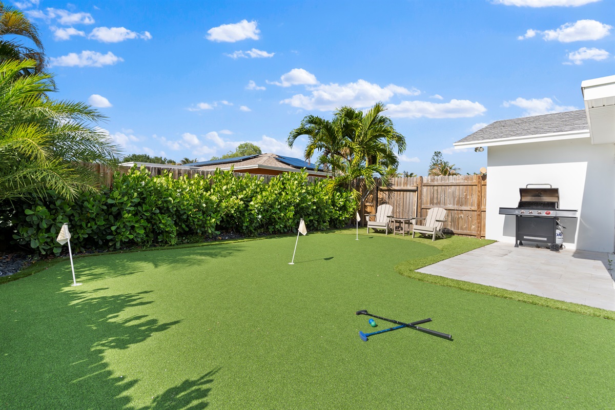 Practice your perfect putt on the private backyard green, designed for endless fun and friendly competition.