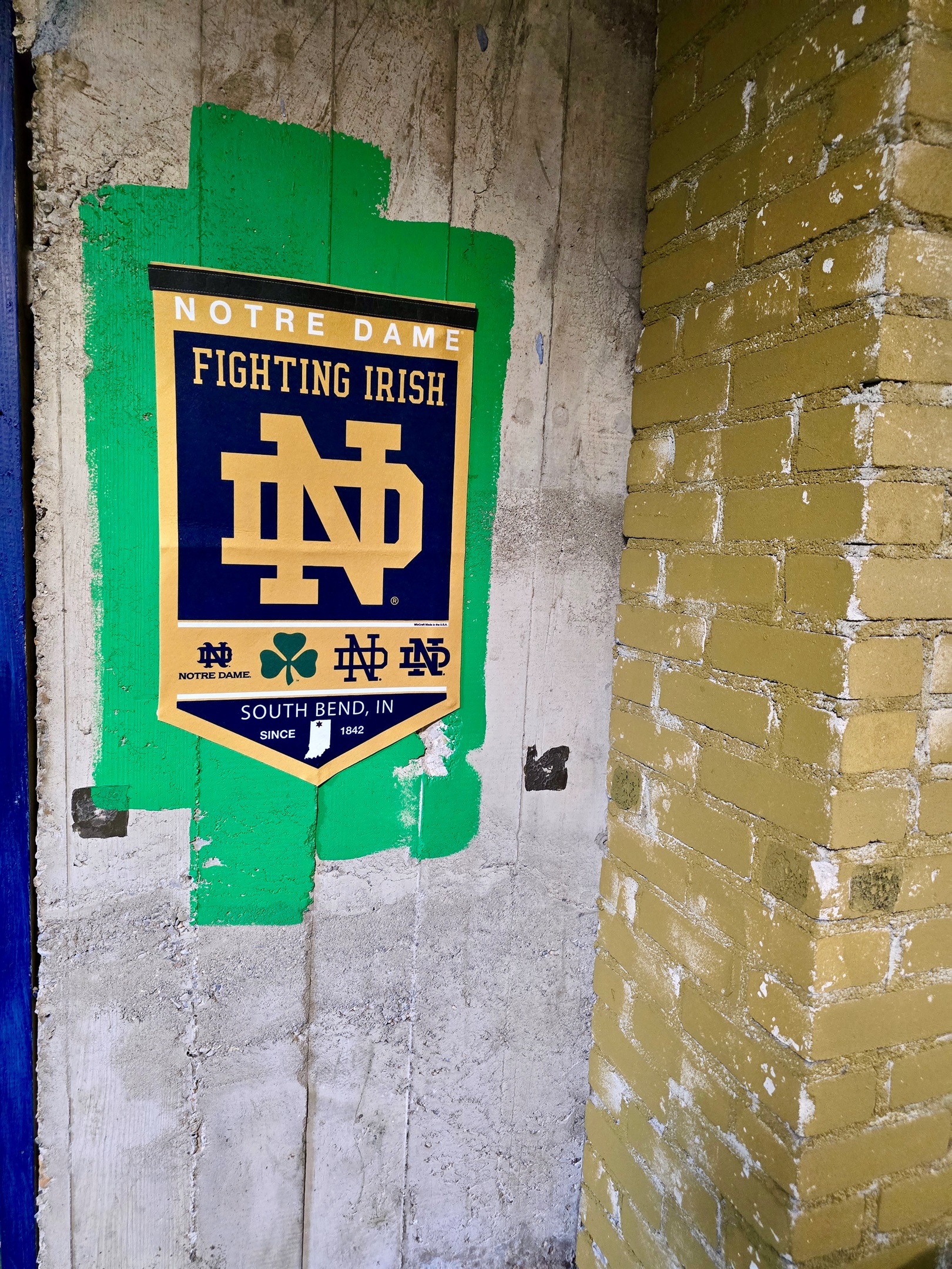 Bold ND accents pop against exposed textures and modern finishes—bringing grit, charm, and Fighting Irish spirit to every corner of the Energy Hub.