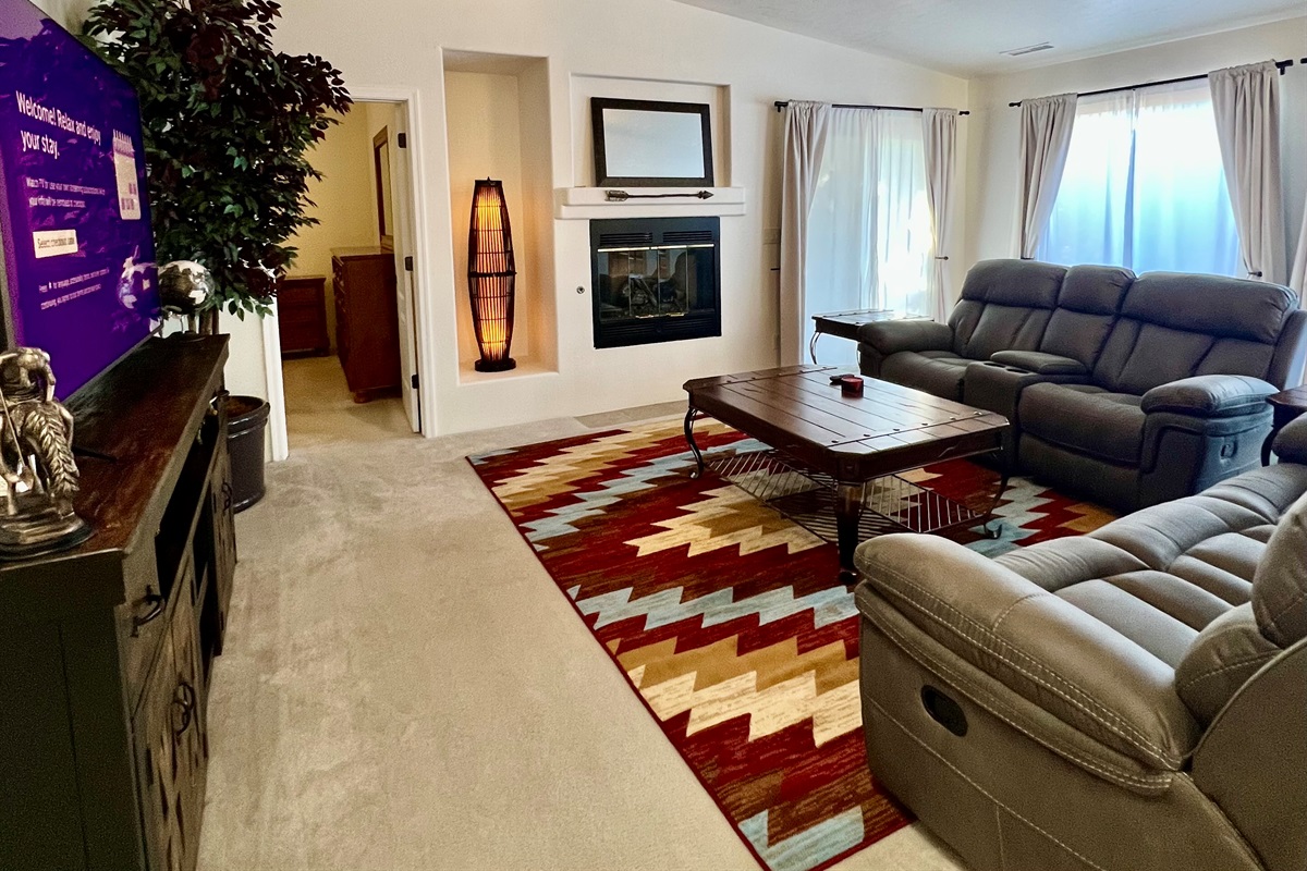 Experience true relaxation in the inviting living room, bathed in natural light