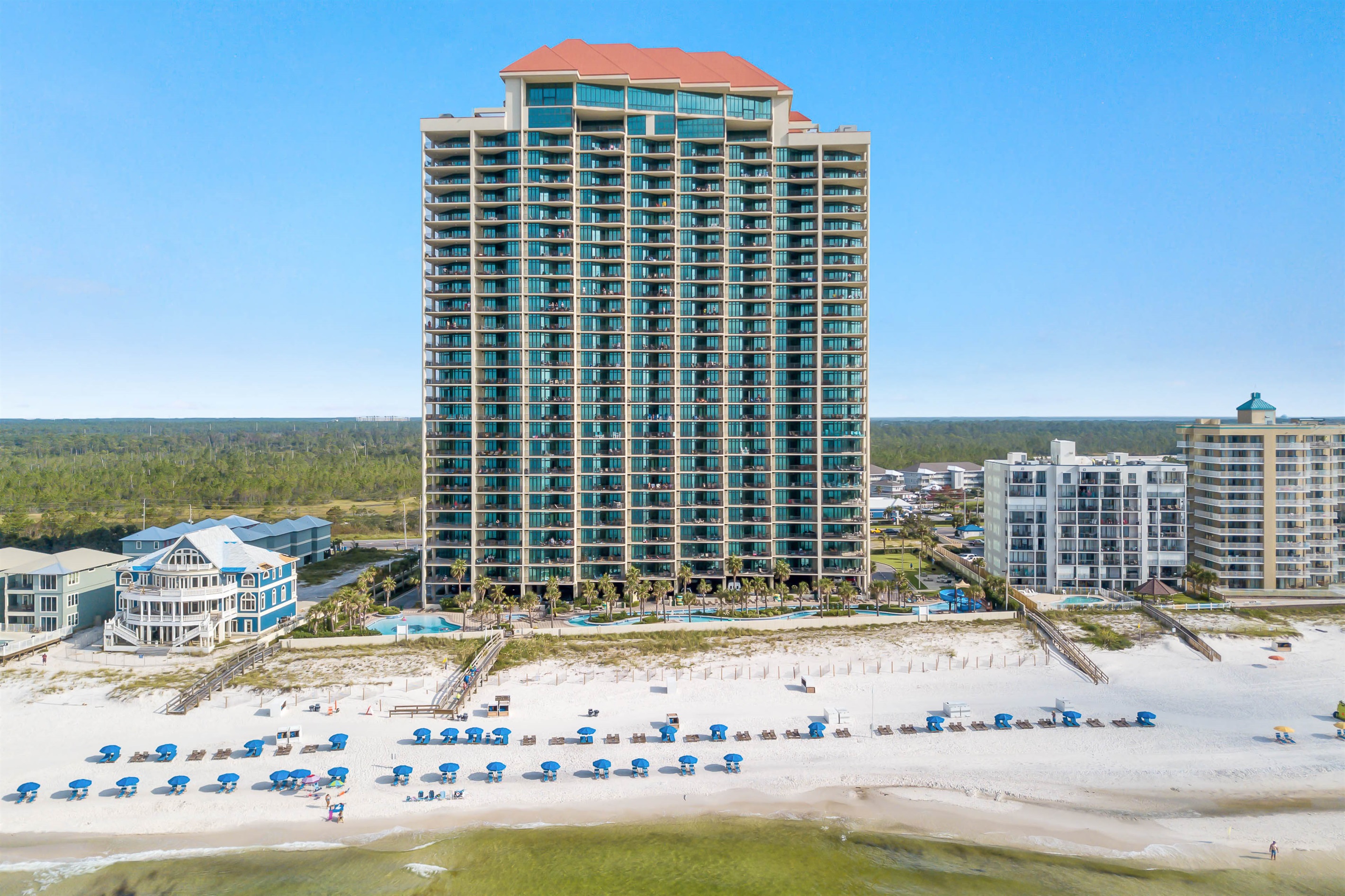 Experience the best of the Alabama coast. Our premier Phoenix West location sits nestled between the emerald waters of the Gulf and the scenic beauty of the vast Gulf State Park, offering breathtaking views from every angle.