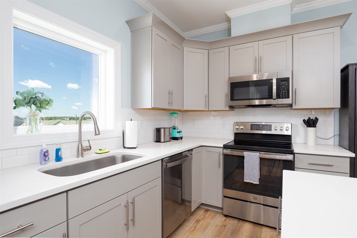 Kitchen features stainless steel appliances