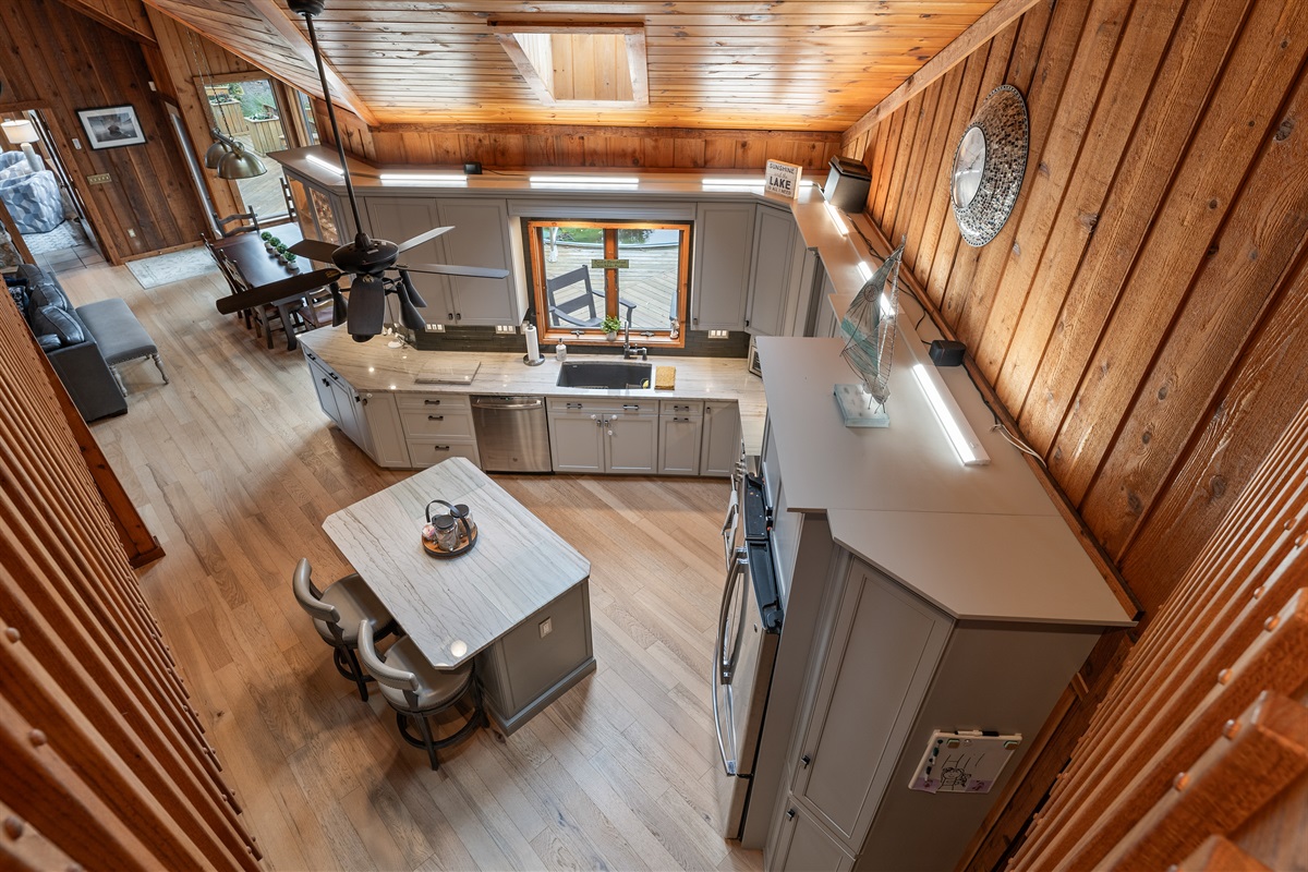 Spacious open floor plan blending dining, living, and kitchen — designed for laughter, connection, and togetherness.