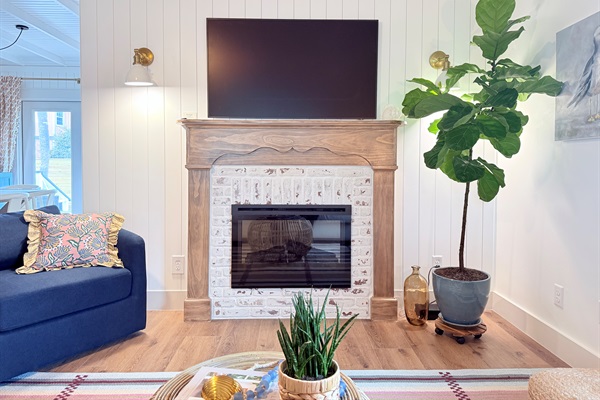 Electric fireplace in the living room and smart frame tv