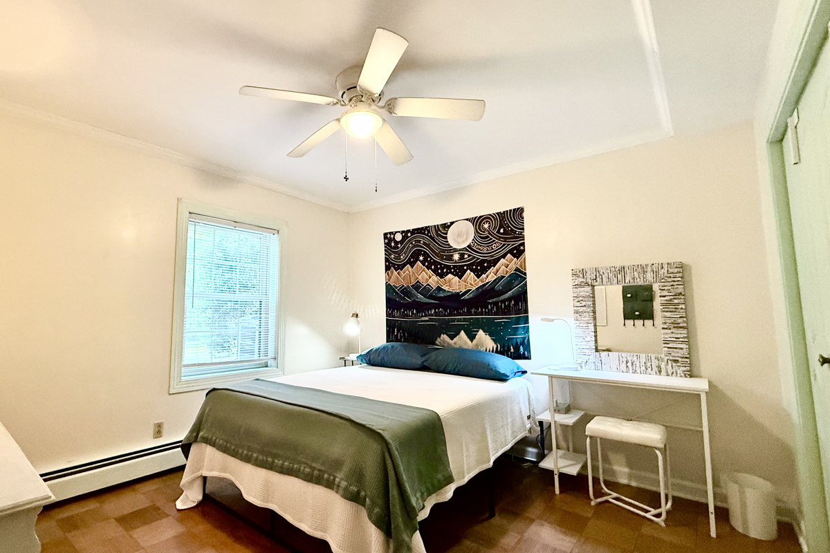Bright and airy bedroom in the lower level of the house