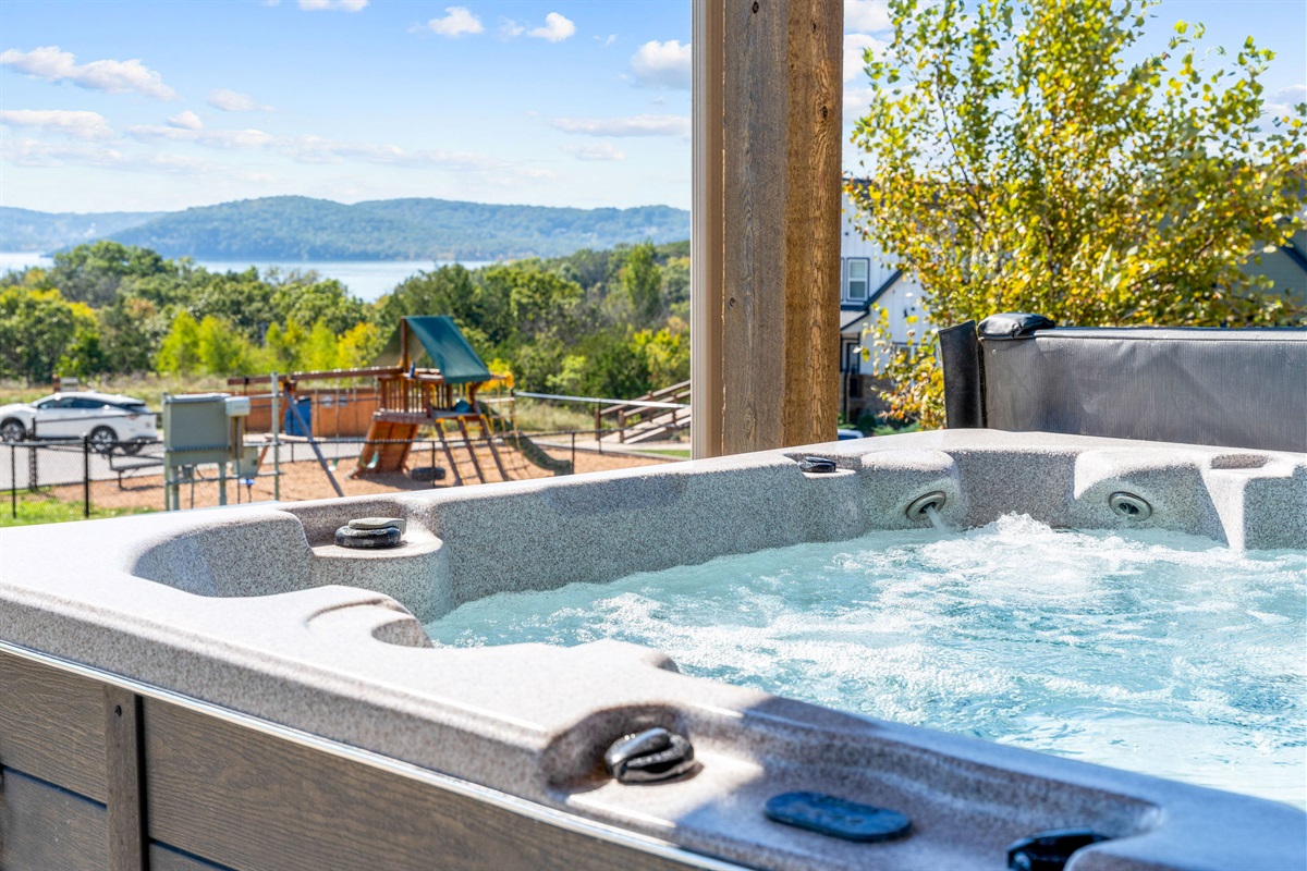 Jump in the hot tub after getting out of the community pool steps away!